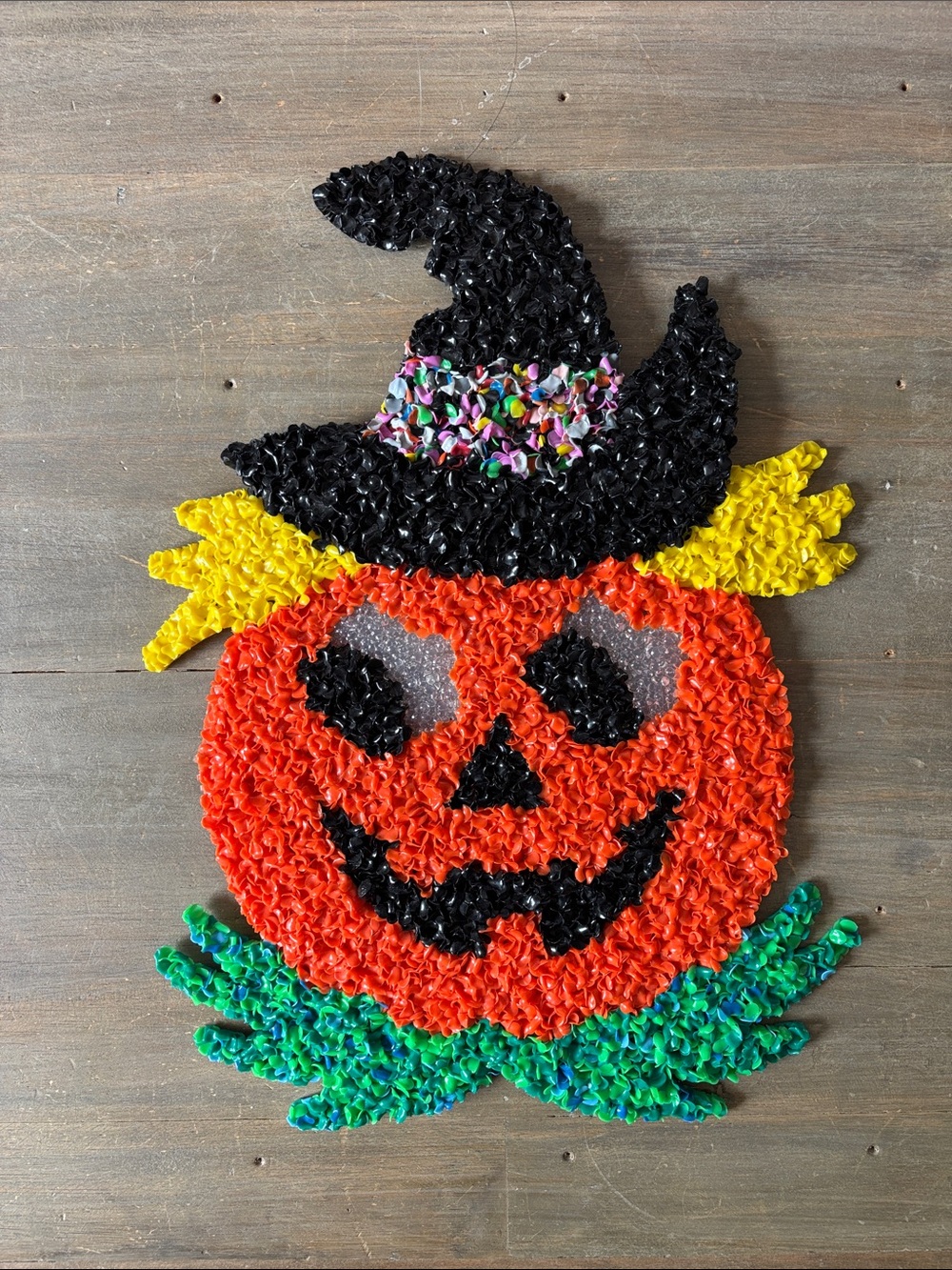 Vintage melted plastic “popcorn” jack-o-lantern Halloween decor